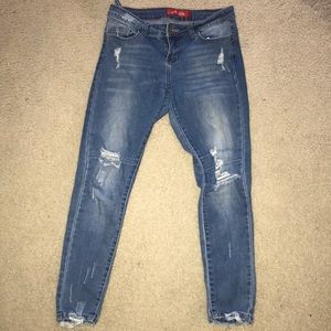 Blue distressed jeans